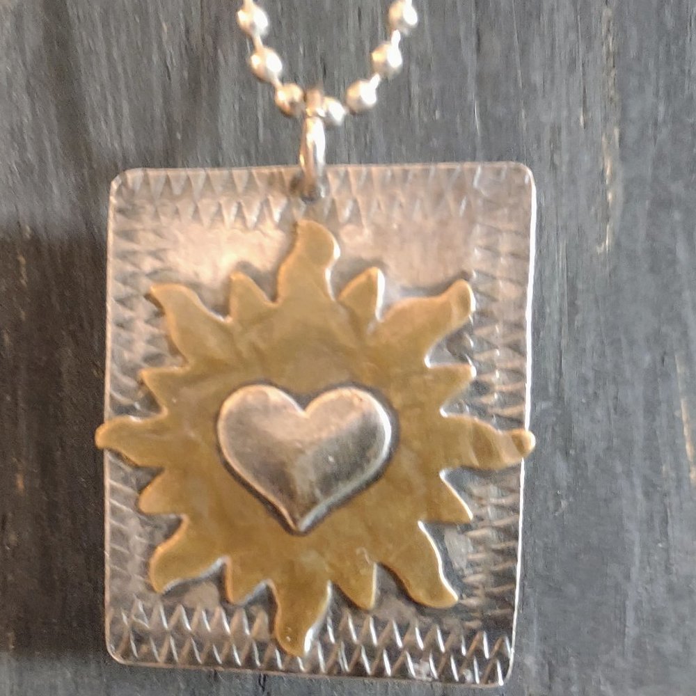 Sterling silver sun pendant on sterling beaded chain